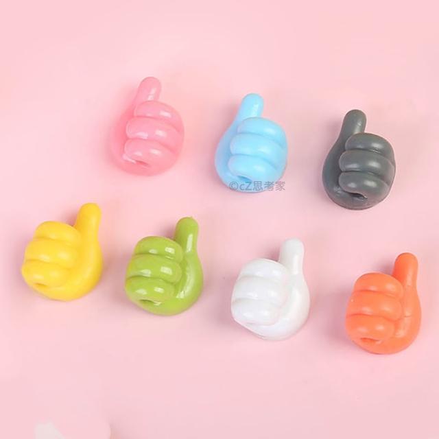 點讚拇指固線器 1入 小拇指款(捲線器 集線器 繞線器 理線器 傳輸線收納 充電線收納)